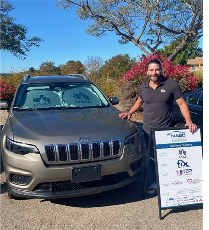 Fix Auto Santee's owner Alex Doria stands beside restored 2020 Jeep Cherokee 
