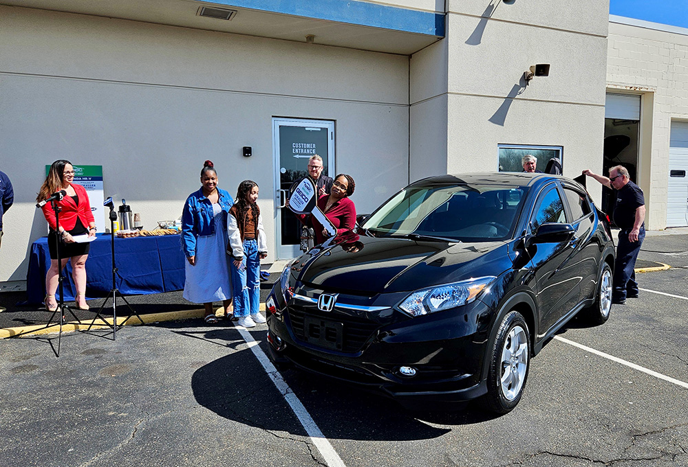 Jazmen Sullivan receiving her 217 Honda CR-V at the NABC Recycled Rides Program vehicle presentation in New Britain, CT